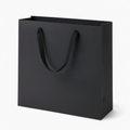 Borsa regalo 30 x 12 x 40 cm in carta nera con manici in nastro - stile minimalista