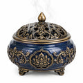 Bruciatore di incenso diametro 20 cm in ceramica blu e metallo dorato traforato decorativo